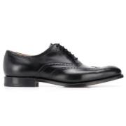 Sorte flade sko til den moderne herre
