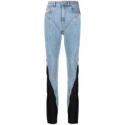 Mellemblå højtaljede jeans med kontrastindsatser