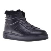 Trainers in black leather and tumbled leather