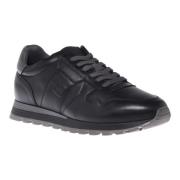 Trainers in black leather and tumbled leather