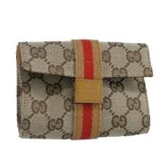 Pre-owned Canvas clutches