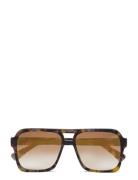 Ossario Sunglasses Firkantede Solbriller Brown Twist & Tango