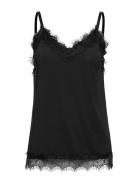 Top From Freequent In A Light Material. The Top Has A Simple Silhouett...