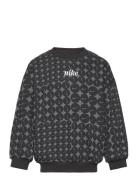 Nkg Essentials Aop Ft Crew Sport Sweatshirts & Hoodies Sweatshirts Bla...