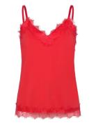 Top From Freequent In A Light Material. The Top Has A Simple Silhouett...