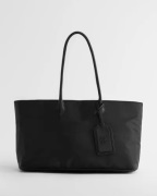 Nelly - Sort - The Nylon Shopper